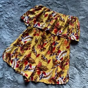 Cute Womens summer feather print romper. Flowy and fitted at the same time.